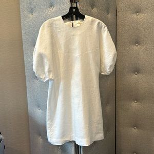 White linen mini dress with puffy sleeves